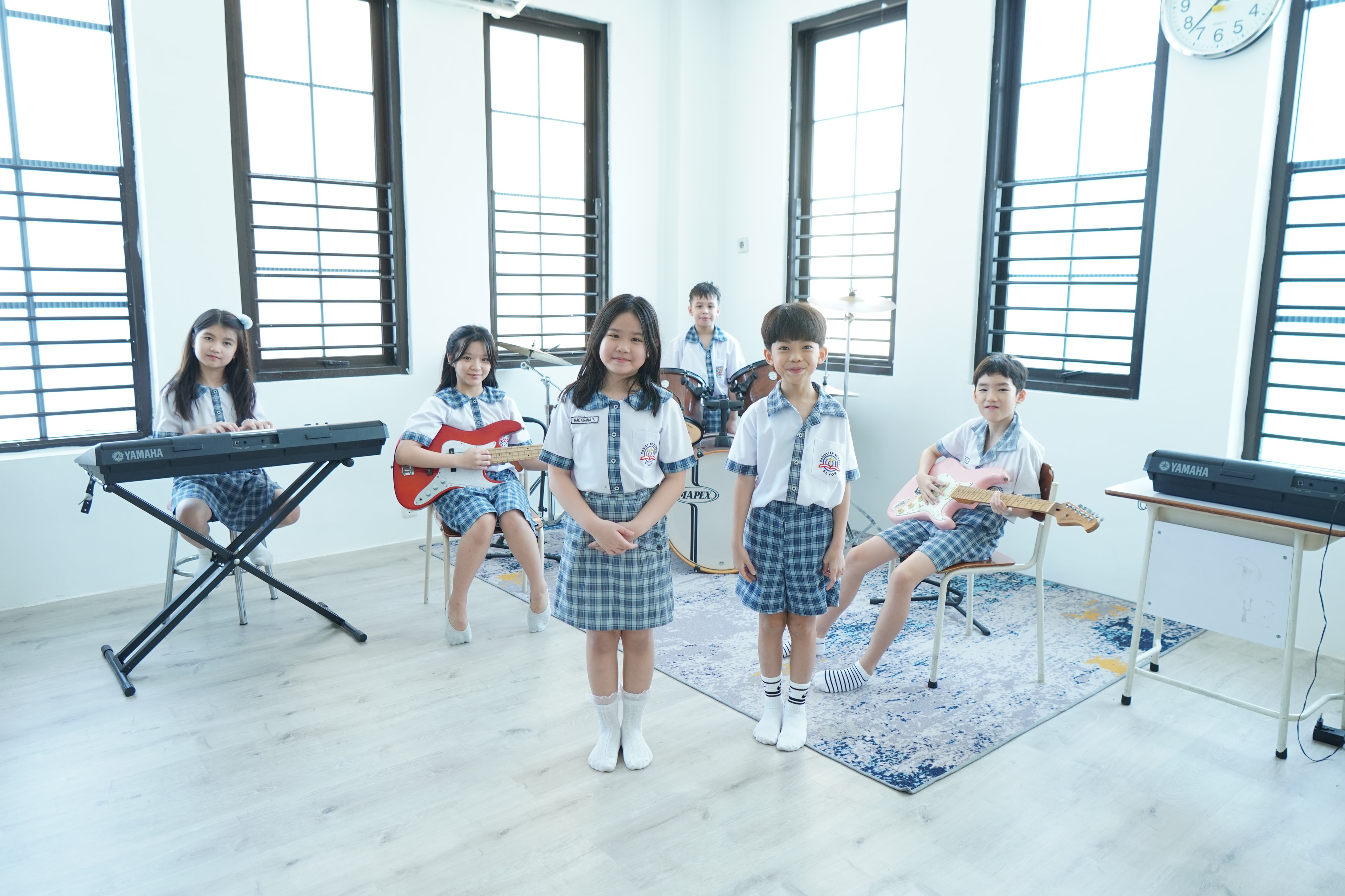 Primary student learning with a teacher